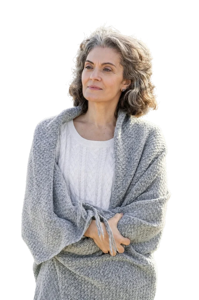 senior woman wearing gray sweater, portrait on white background